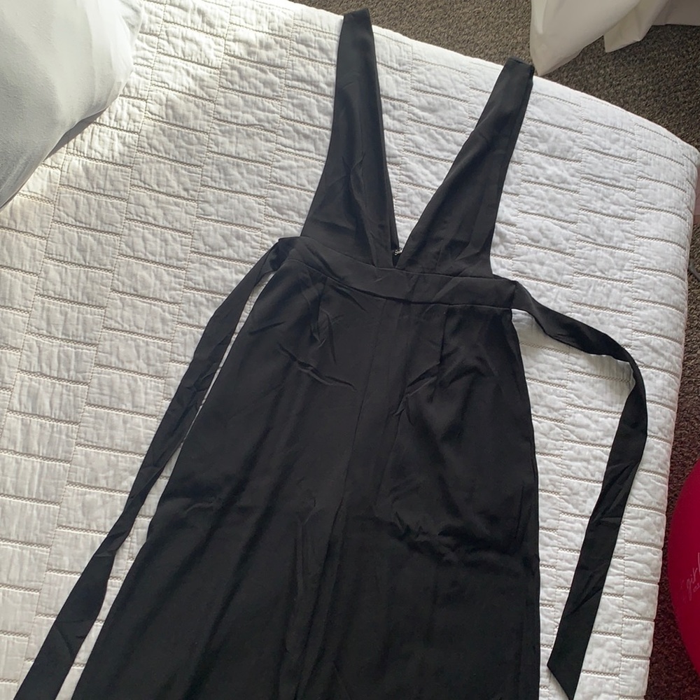 Black sleeveless jumpsuit